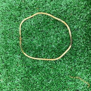 Givenchy gold-toned herringbone chain necklace.